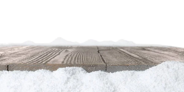 Heap de neve perto de superfície de madeira isolada em branco — Fotografia de Stock