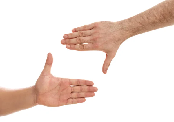 Man gör ram med händerna på vit bakgrund, närbild — Stockfoto