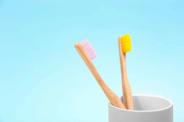 Toothbrushes Made Bamboo Holder Light Blue Background Space Text — Stock Photo, Image