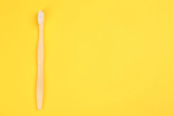 Toothbrush Made Bamboo Yellow Background Top View Space Text — Stock Photo, Image