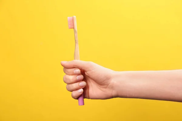Woman Holding Bamboo Toothbrush Yellow Background Closeup — Stock Photo, Image