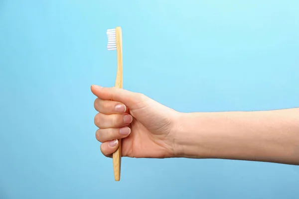 Woman Holding Bamboo Toothbrush Light Blue Background Closeup — Stock Photo, Image