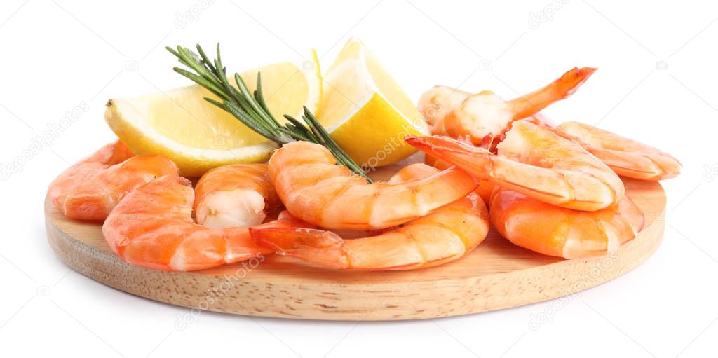Delicious cooked shrimps served with lemon and rosemary on white