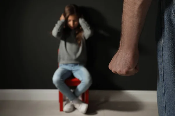 Man threatening his daughter indoors, closeup. Domestic violence — Stock Photo, Image