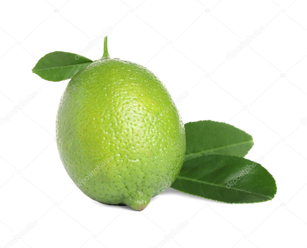 Fresh ripe lime with green leaves isolated on white
