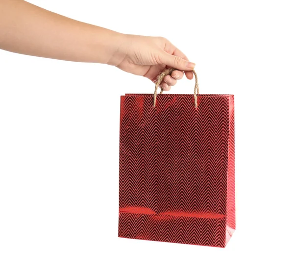 하얀 배경에 빨간 종 이 쇼핑백을 들고 있는 여자, 클로 세우 — 스톡 사진