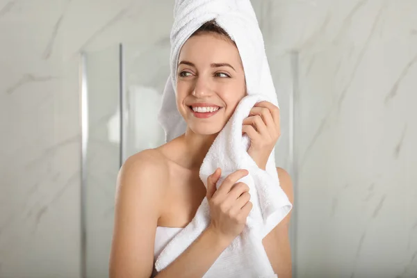 Young Woman Wiping Face Towel Bathroom — Stok fotoğraf