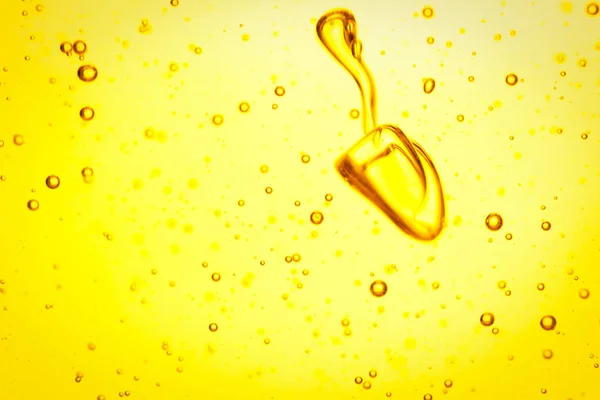 Olio da cucina con bolle come sfondo, primo piano — Foto Stock