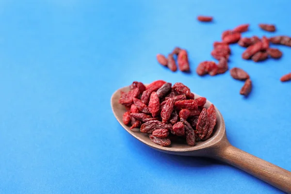 Dried Goji Berries Spoon Blue Background Closeup Space Text — Stock Photo, Image