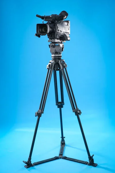 Modern Professional Video Camera Blue Background — 스톡 사진