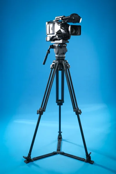 Modern Professional Video Camera Blue Background — 스톡 사진