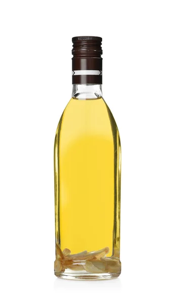 Vaření olej ve skleněné láhvi izolované na bílém — Stock fotografie