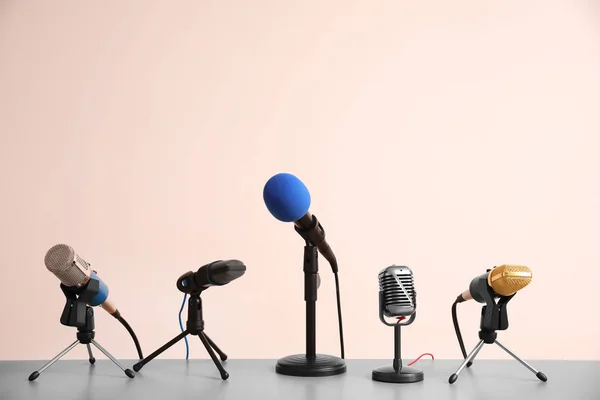 Different Microphones Light Grey Table Journalist Work — 스톡 사진