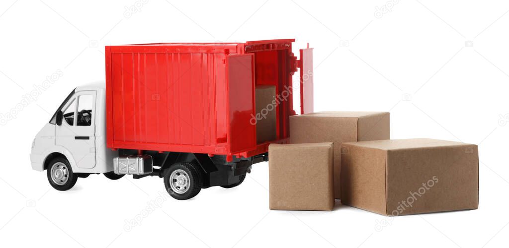 Toy truck with boxes isolated on white. Logistics and wholesale concept