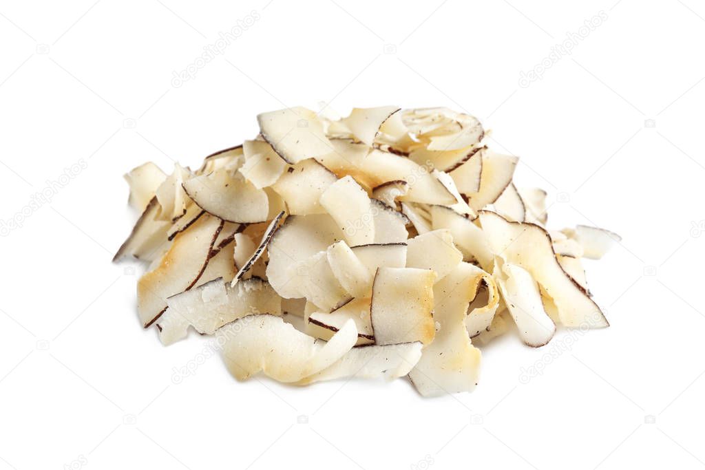 Pile of coconut chips isolated on white