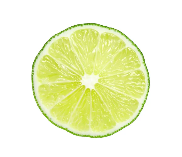Świeże dojrzałe limonki pokrojone na biało — Zdjęcie stockowe
