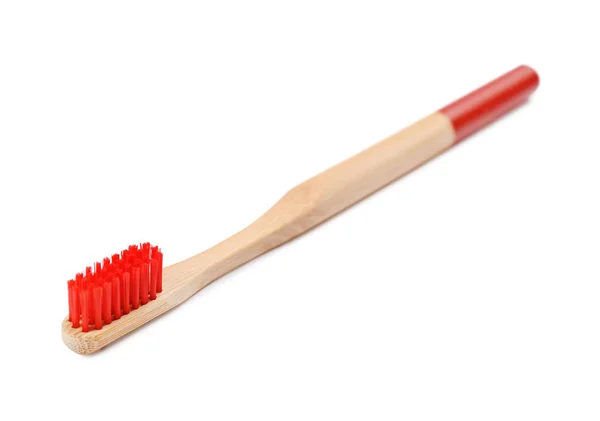 Bamboo toothbrush with red bristle isolated on white — Stock Photo, Image