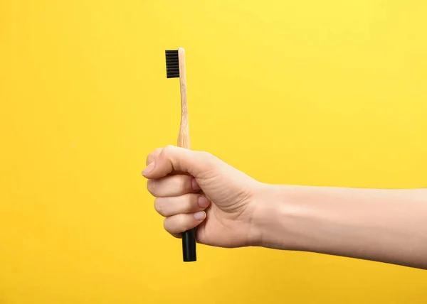 Woman Holding Bamboo Toothbrush Yellow Background Closeup — Stock Photo, Image