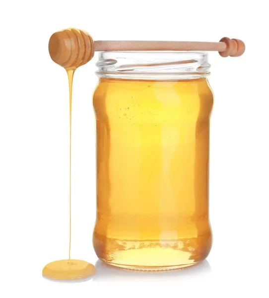 Jar of organic honey and dipper isolated on white — Stock Photo, Image