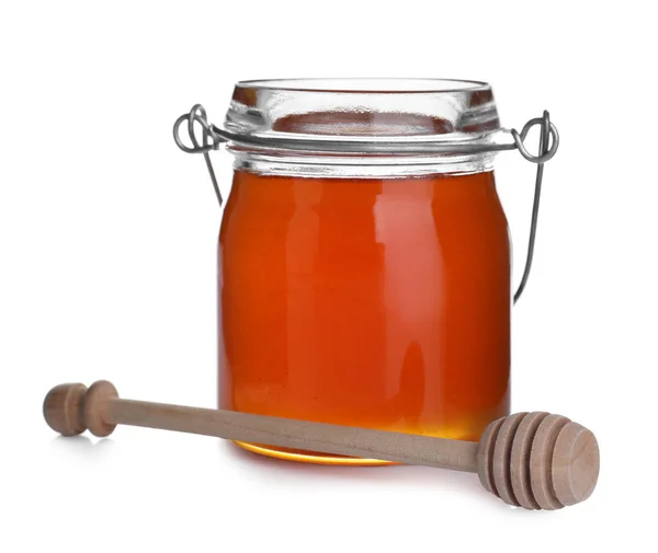 Sklenice organického medu a drtiče izolované na bílém — Stock fotografie