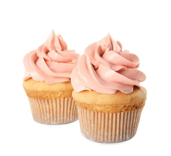 Deliciosos cupcakes de cumpleaños decorados con crema sobre fondo blanco — Foto de Stock
