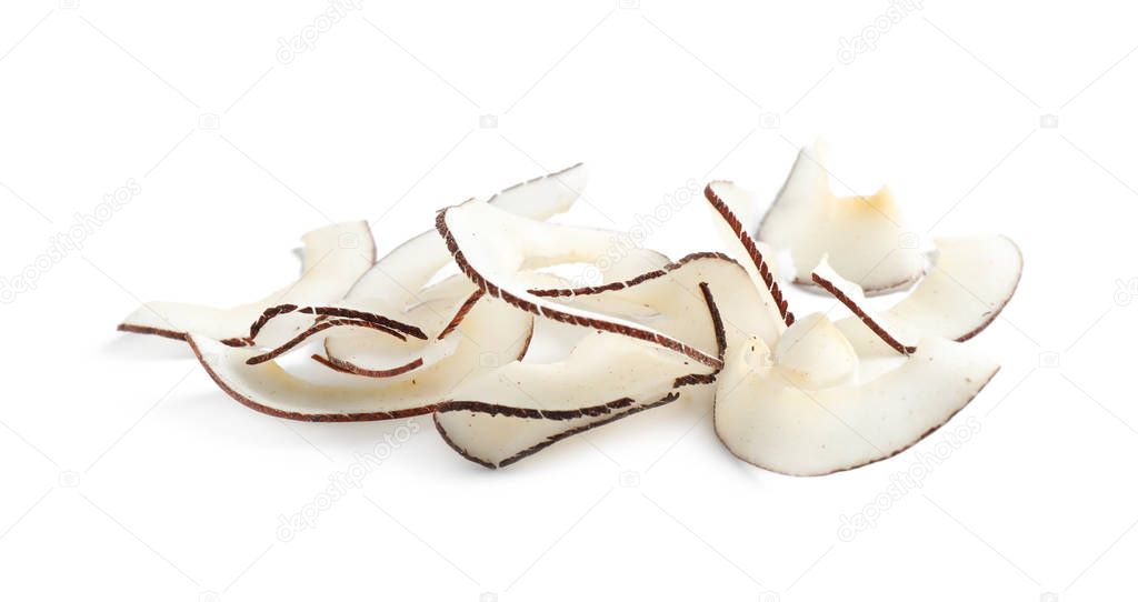 Pile of tasty coconut chips isolated on white