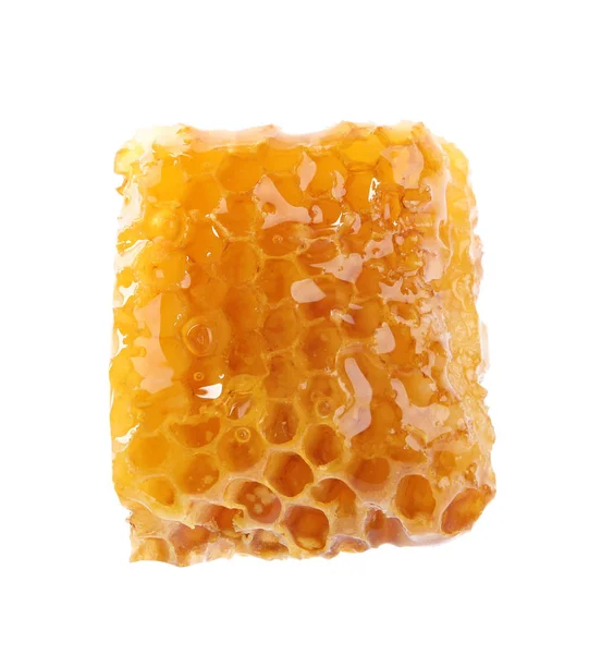 Piece of tasty fresh honeycomb isolated on white — ストック写真