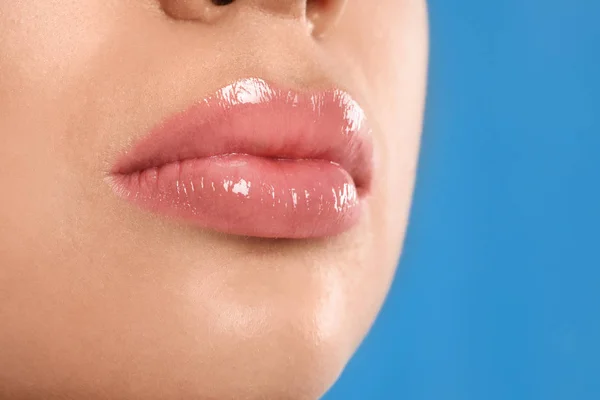 Young Woman Beautiful Full Lips Light Blue Background Closeup — 스톡 사진