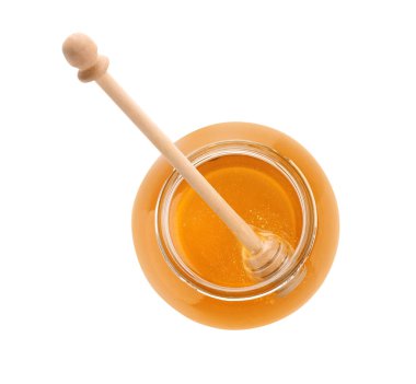 Jar of organic honey and dipper isolated on white, top view