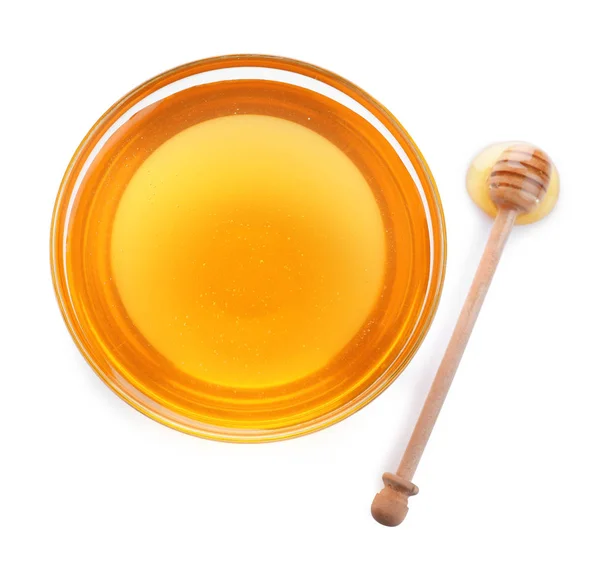 Bowl of organic honey and dipper isolated on white, top view — Stock Photo, Image