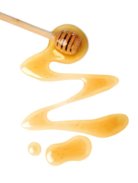 Sweet honey and dipper on white background, top view — 스톡 사진