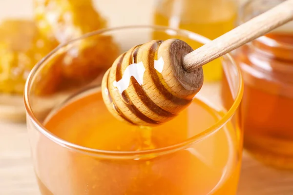 Dripping Tasty Honey Dipper Glass Table Closeup — Stock Photo, Image