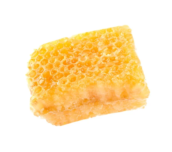 Pedaço de favo de mel fresco saboroso isolado em branco — Fotografia de Stock