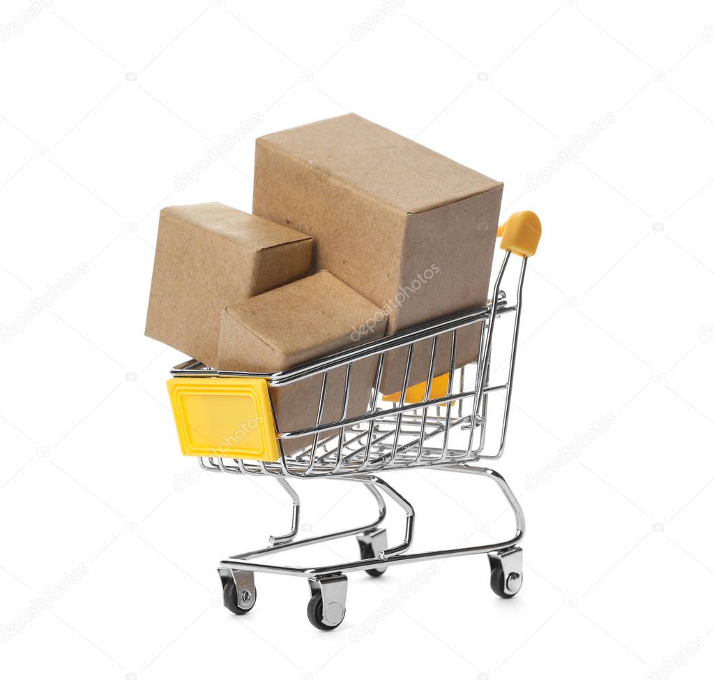 Shopping cart with boxes isolated on white. Logistics and wholes