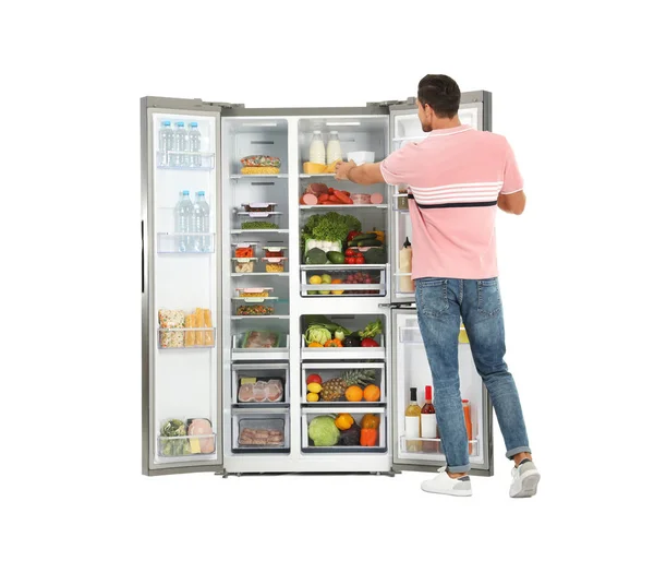 Человек Берет Сыр Холодильника Белом Фоне — стоковое фото