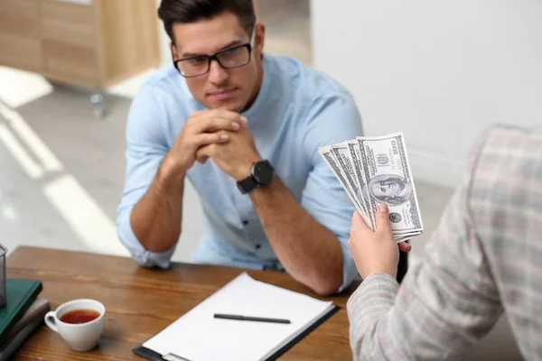 Woman Offering Bribe Money Man Table — Stock Photo, Image