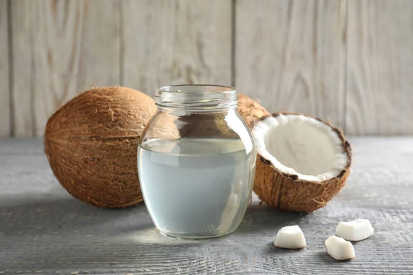 Composición Con Aceite Coco Sobre Mesa Madera Gris — Foto de Stock