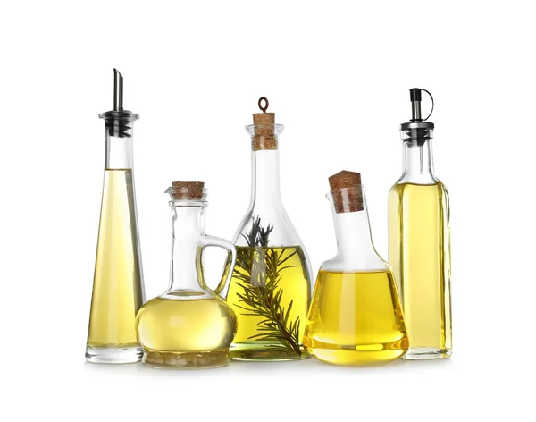 Different sorts of cooking oil in bottles isolated on white — Stock Photo, Image