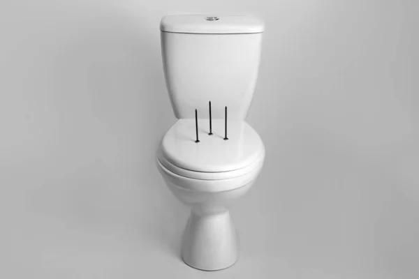 Toilet Bowl Nails White Background Hemorrhoids Concept — 스톡 사진