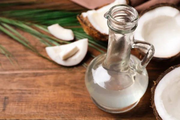 Aceite Coco Sobre Mesa Madera Espacio Para Texto — Foto de Stock