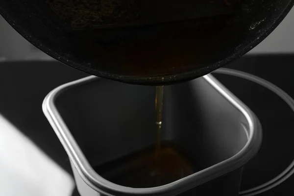 Pouring Used Cooking Oil Frying Pan Container Closeup — 스톡 사진