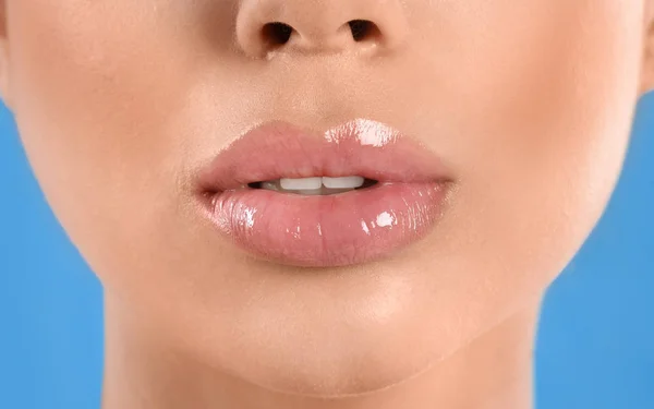 Young Woman Beautiful Full Lips Light Blue Background Closeup — 스톡 사진