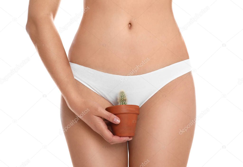 Woman with cactus showing smooth skin on white background, closeup. Brazilian bikini epilation