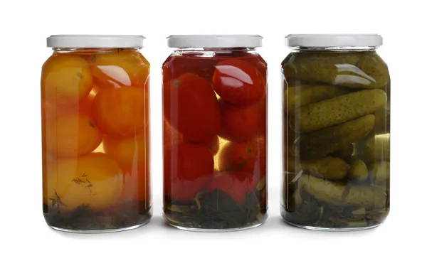 Glass jars of different pickled vegetables isolated on white — 스톡 사진