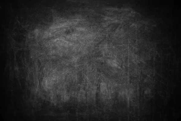 Dirty black chalkboard as background. Space for text — 스톡 사진