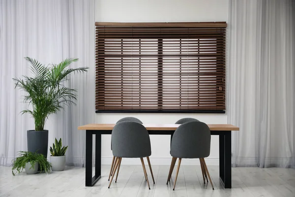 Modern empty wooden table in room interior — Stock Photo, Image