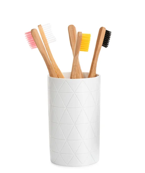 Bamboo toothbrushes in holder isolated on white — Stock Photo, Image
