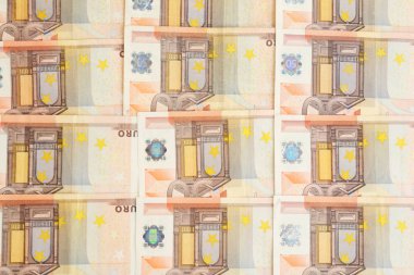 Arka plan olarak Euro banknotları, üst görünüm. Para ve finans