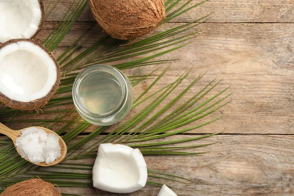 Platte Lay Compositie Met Kokosolie Houten Tafel Ruimte Voor Tekst — Stockfoto