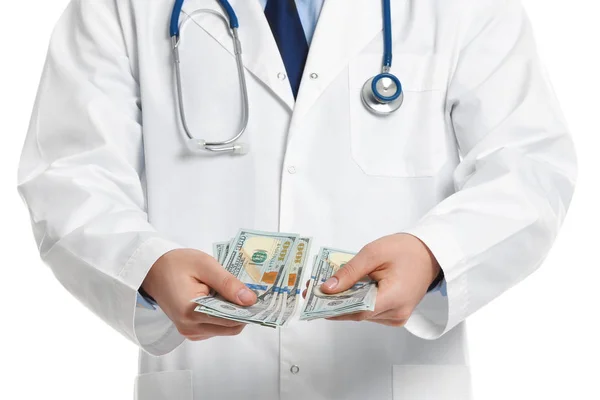 Dokter met omkoping op witte achtergrond, close-up. Corruptie in mij — Stockfoto